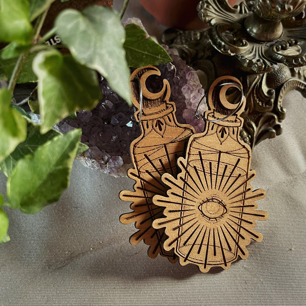 Boucles d’oreilles pendantes - Fiole rayonnante 